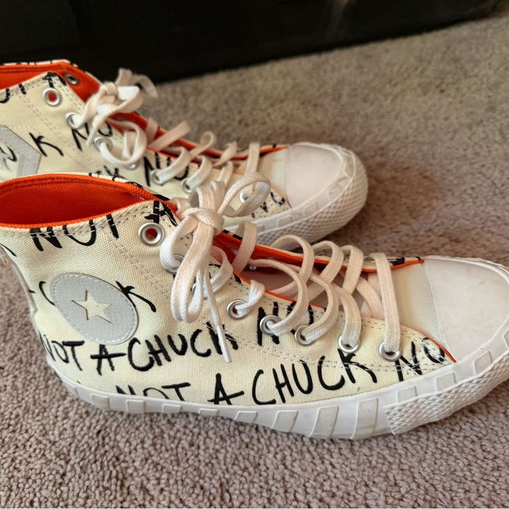 Converse High Top Sneakers in White with Orange Lining and Black Script